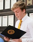 Eric-Hunter-Natl-Beta-Club-VP-at-school-board-meeting.jpg
