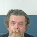 Mitchell man arrested after punching woman in mouth