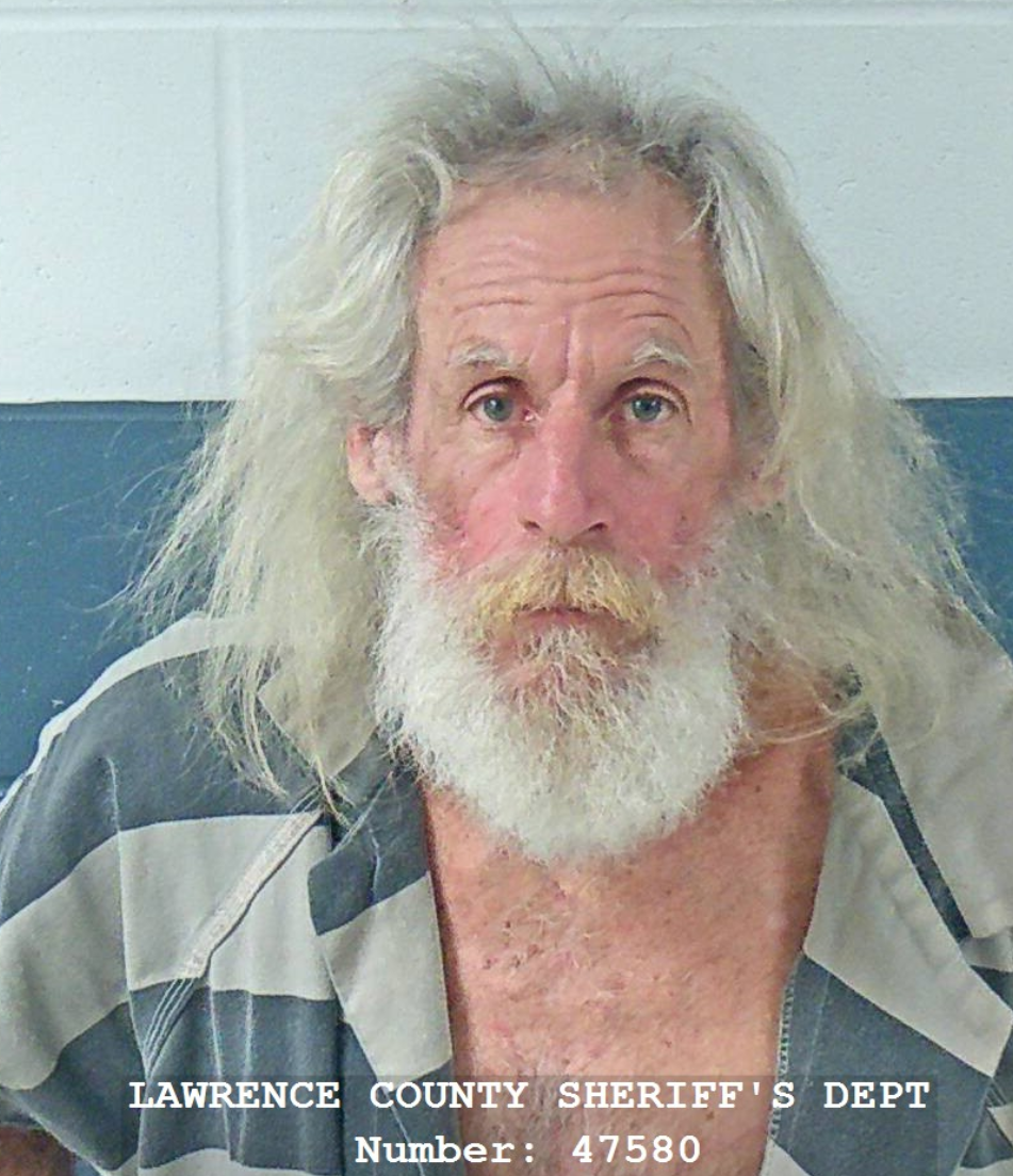 Bloomington man arrested after being found intoxicated behind a Bedford business