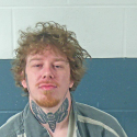 Bedford man arrested on residential entry charge after crawling through hole in neighbor’s door